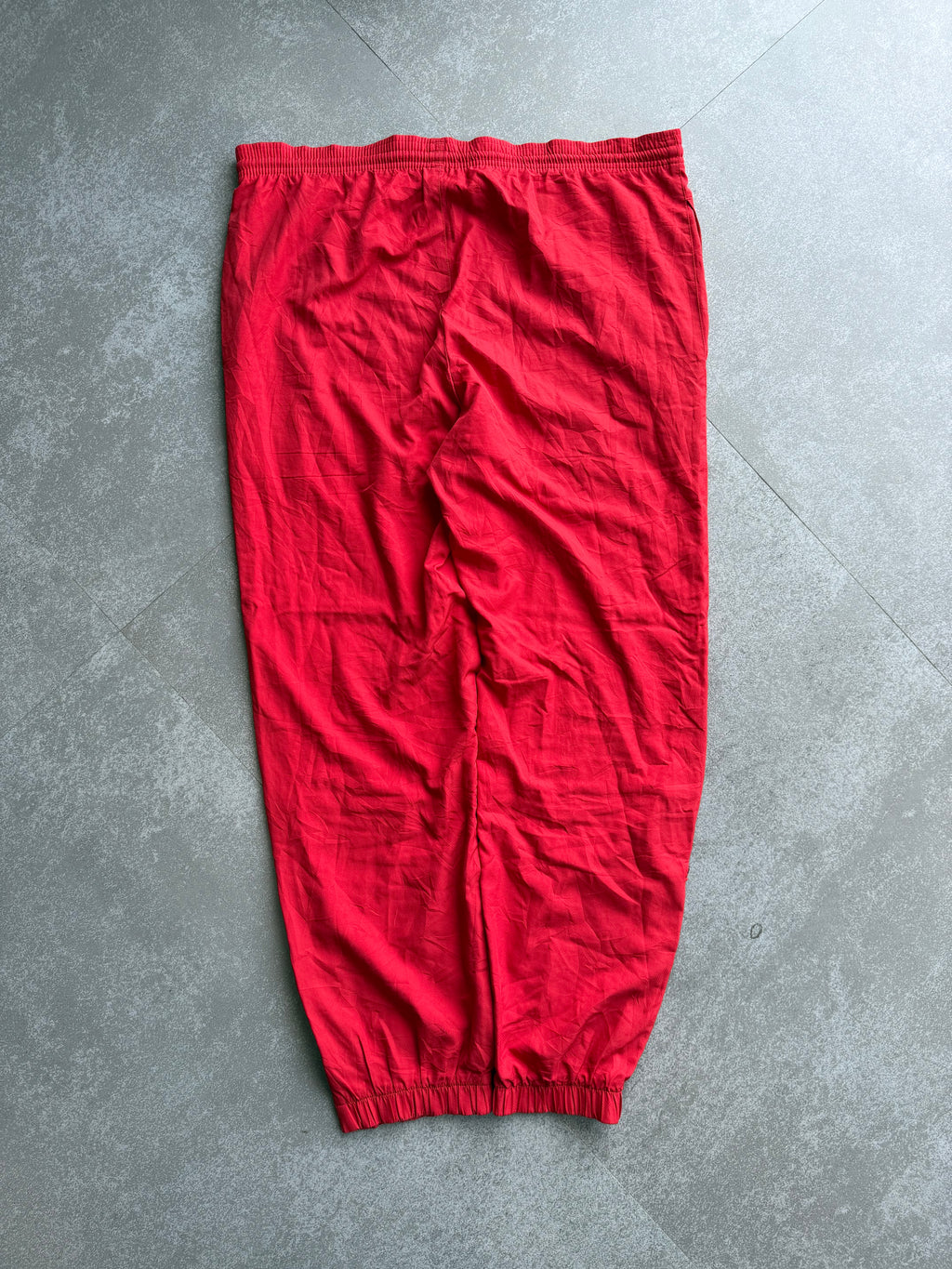 RED LACOSTE TRACK PANTS -XL